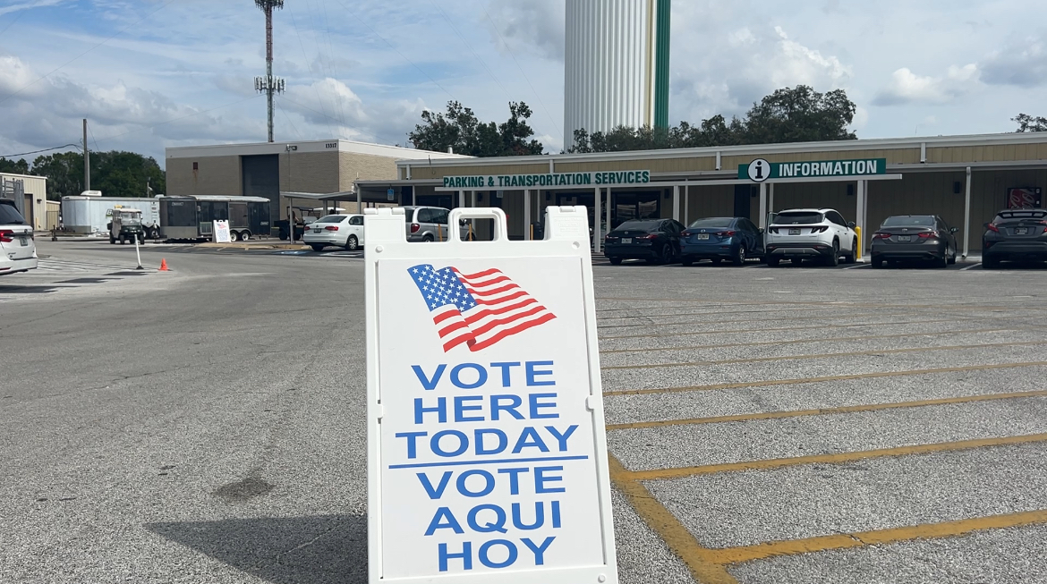 vote here today sign in front of a polling location