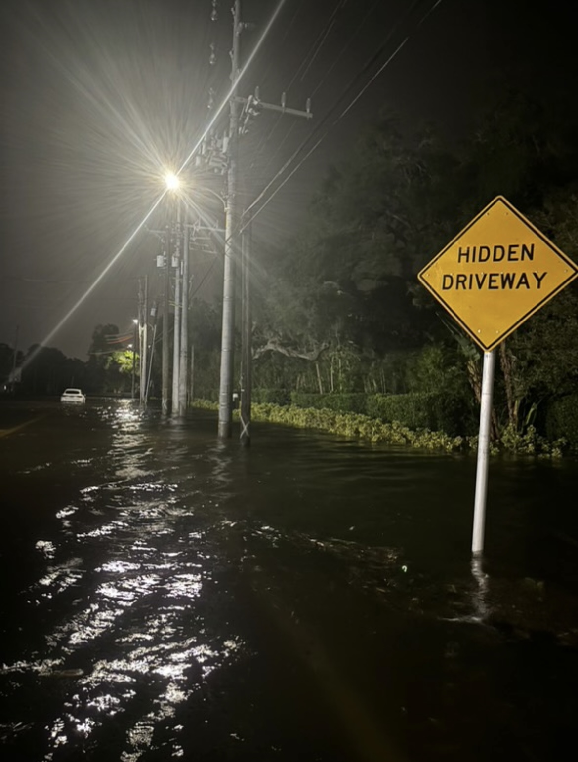 Water covering the street during Hurricane Helene.