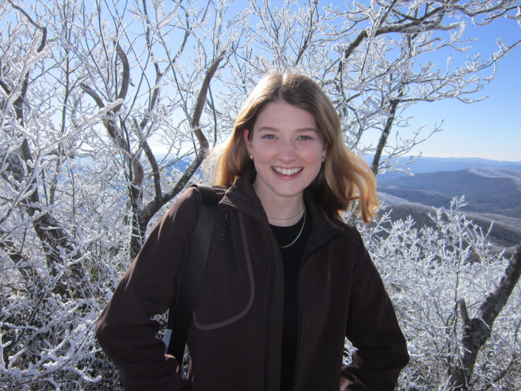 This is a photo of Ana Stephens, a USF student, posing in front of a tree. Image by Ana Stephens