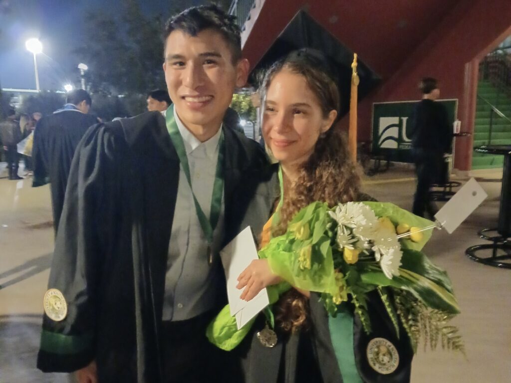 This is a picture of Baylee Aguilar next to her classmate Steven Tsang at their graduation ceremony. Image by Lupe Aguilar