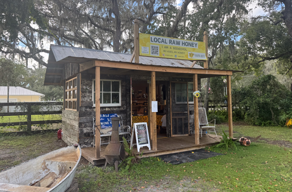 A small but beautiful storefront known as the Bee Shack has its doors open for any customers that come by. 