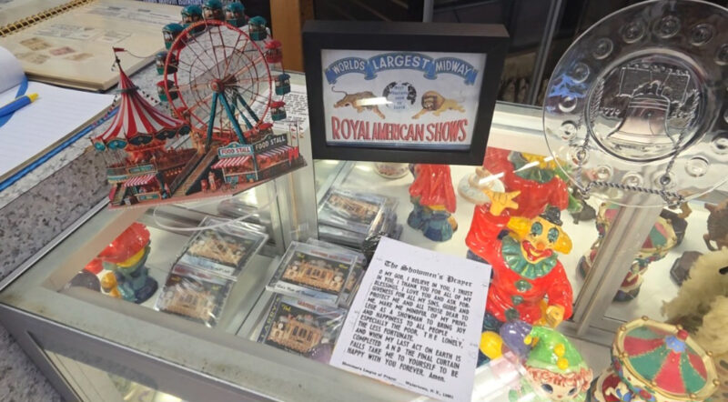 Carnival memorabilia sits on a glass display case